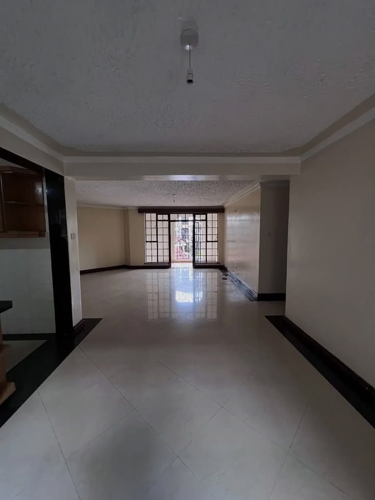 Open-plan living area with balcony doors