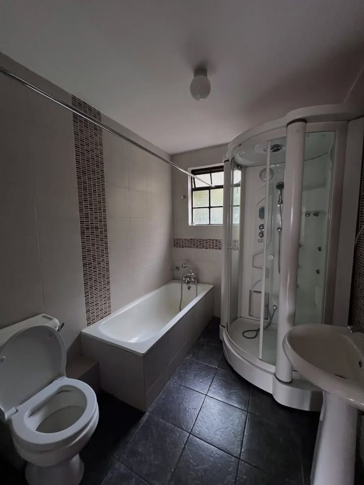 Bathroom with bathtub and separate shower