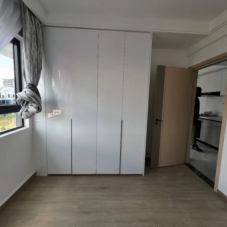 Bedroom with built-in wardrobes