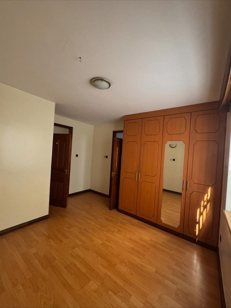 Second bedroom with wardrobes
