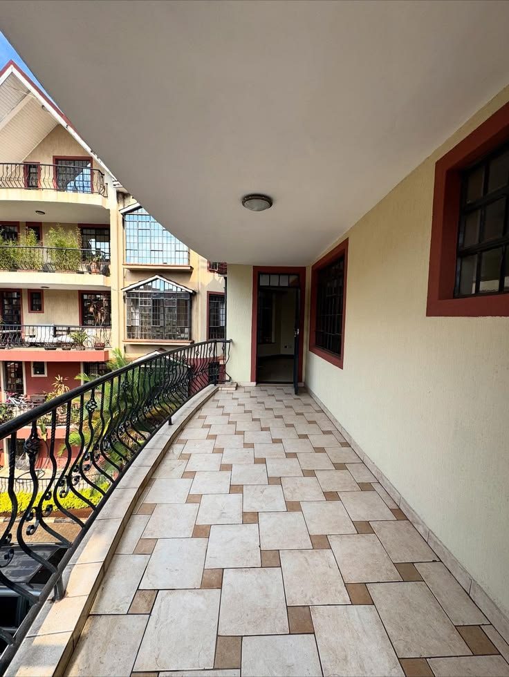Private balcony over a green courtyard
